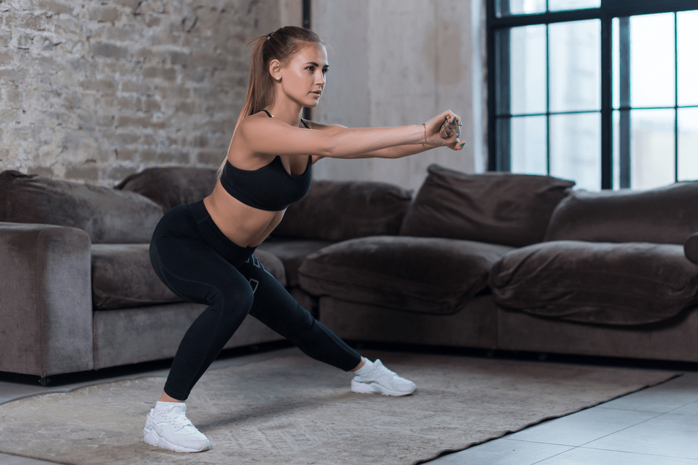 Side Lunge With overhead plate hold